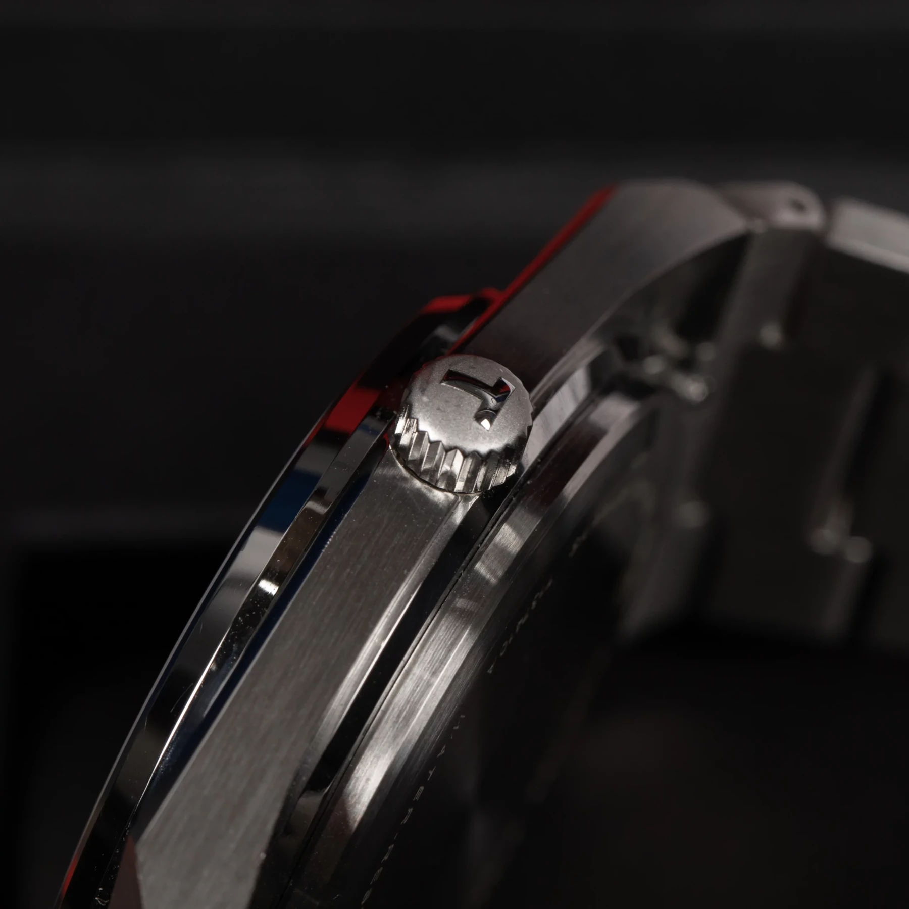Close-up of the Tissot PRX stainless steel case and bracelet